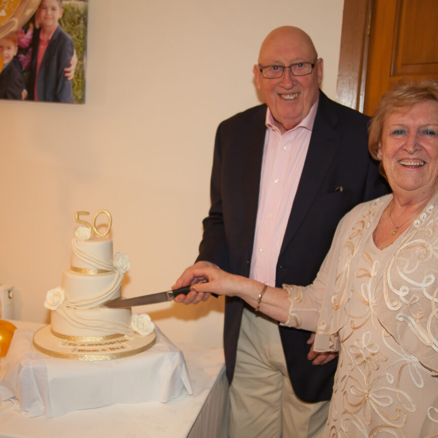 Couple cutting wedding cake - Event Photography - Walsall Wolverhampton and West Midlands - Jo Buckley Photography
