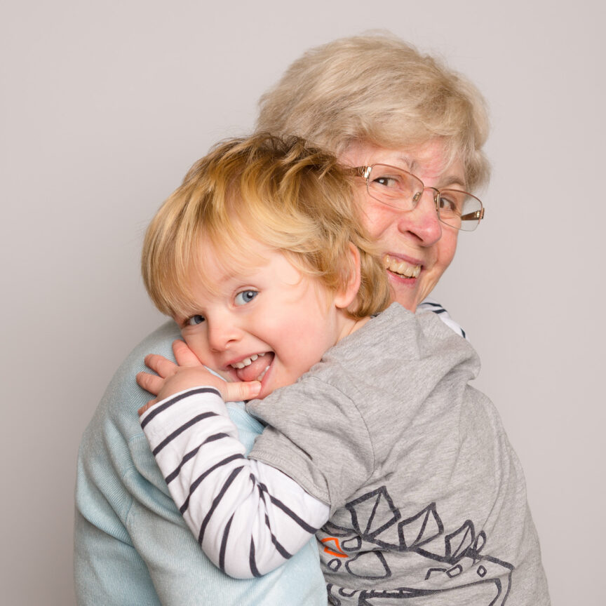 Hugging and smiling to camera - Nursery Playgroup Photography - Walsall Wolverhampton and West Midlands - Jo Buckley Photography