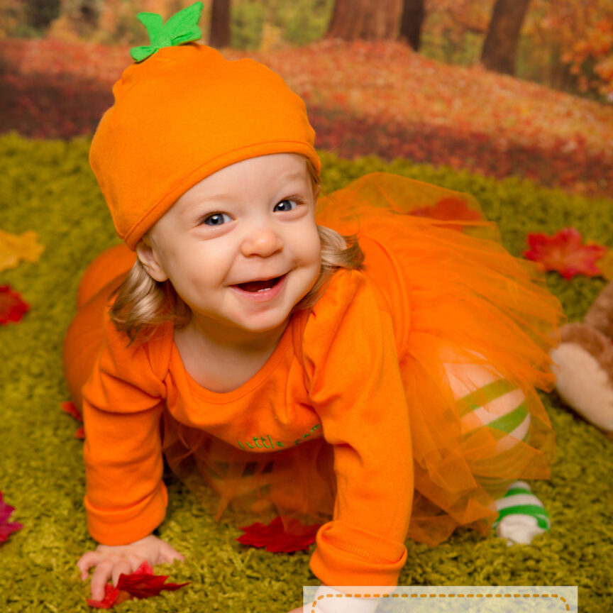 smiling child in pumpkin costume - Photo Sensory - Walsall Wolverhampton and West Midlands - Jo Buckley Photography