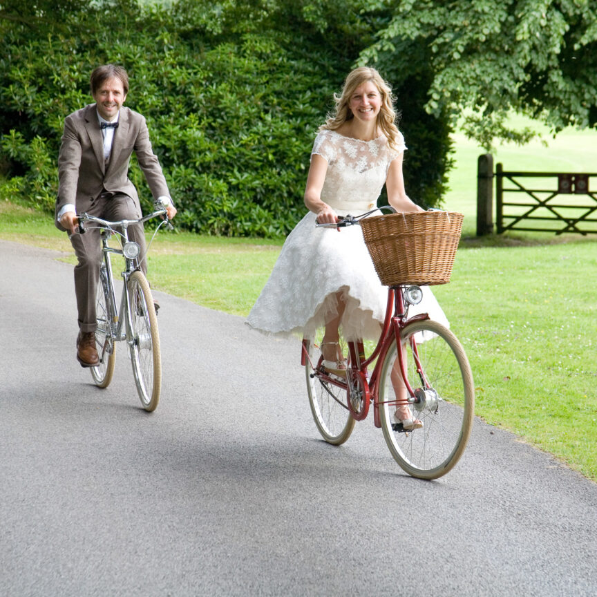 Bride and groom riding bikes outdoors - Wedding Photography - Walsall Wolverhampton and West Midlands - Jo Buckley Photography